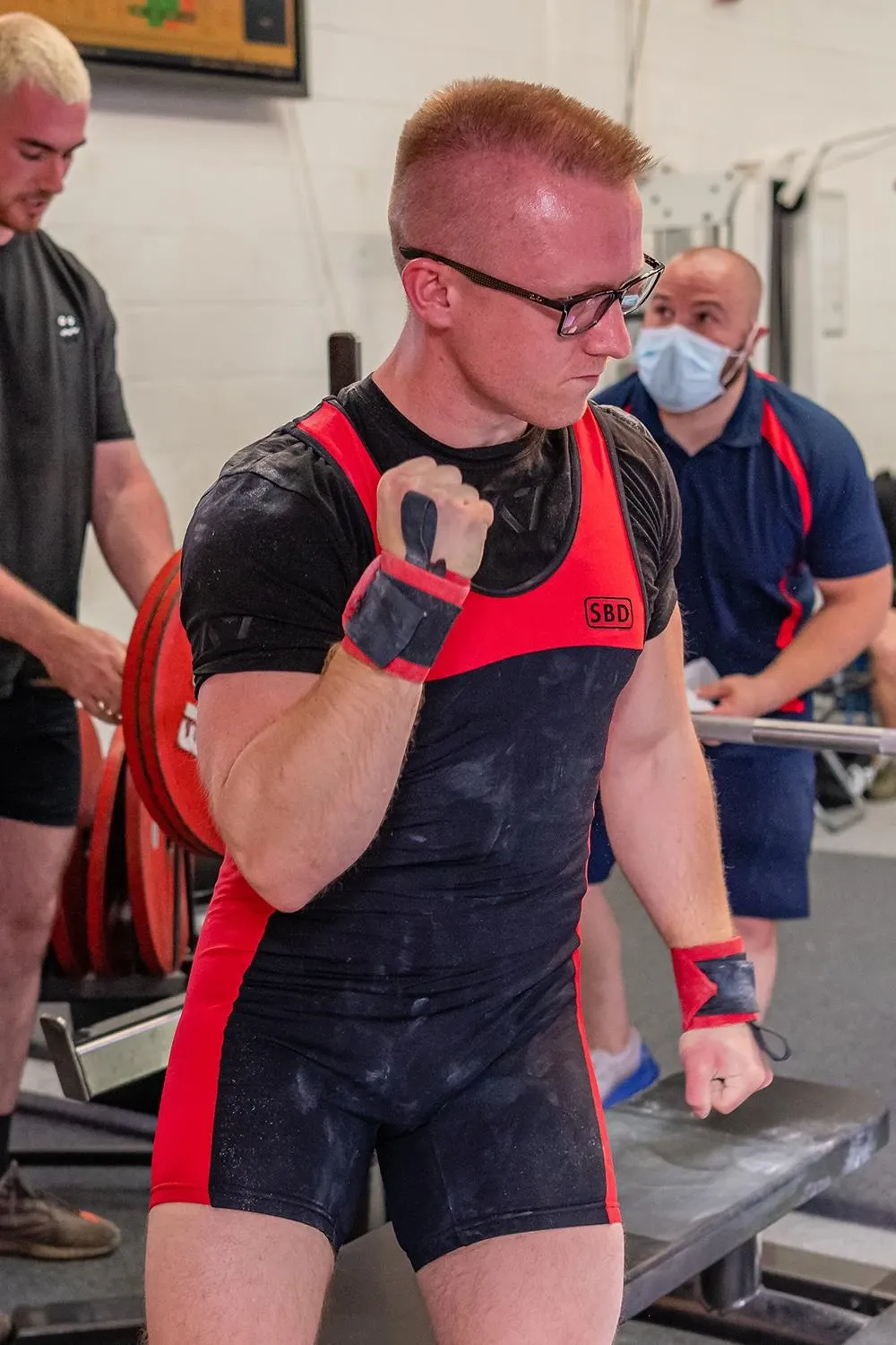 Andrew pumping his fist as he walks off the bench after a good lift