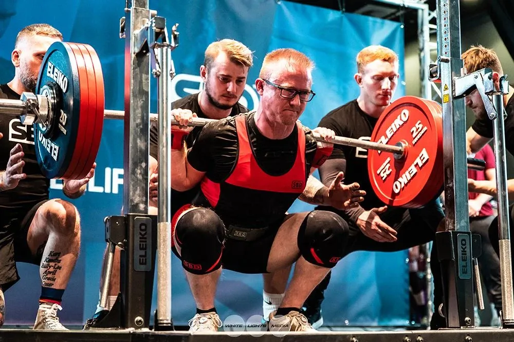 Andrew at the bottom of his 222.5 kg squat, a competition personal best
