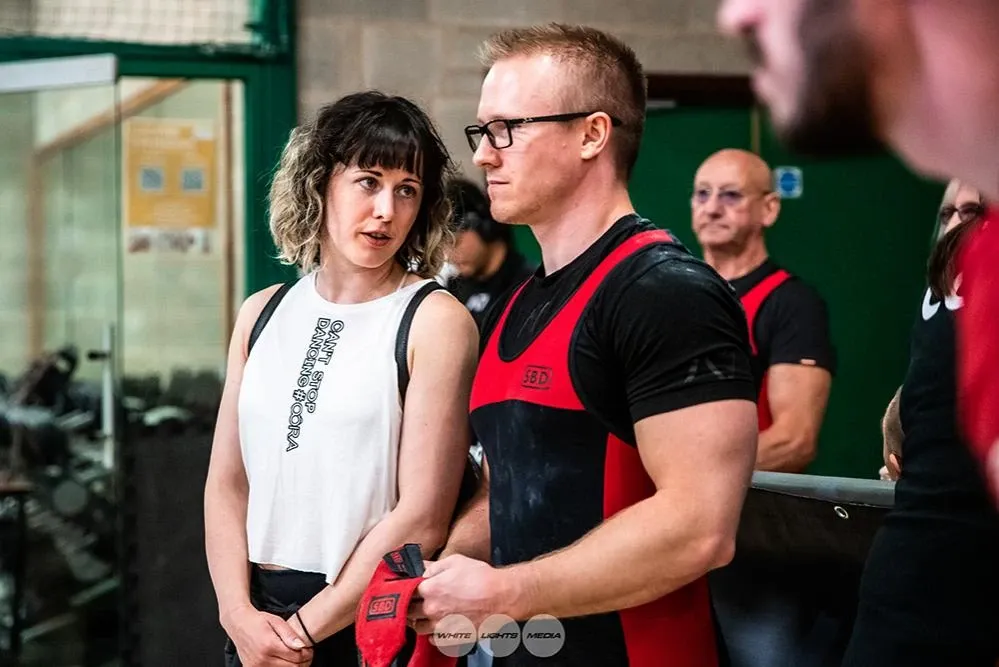 Aimee, who was handling Andrew, talking him through the 170 kg attempt to come