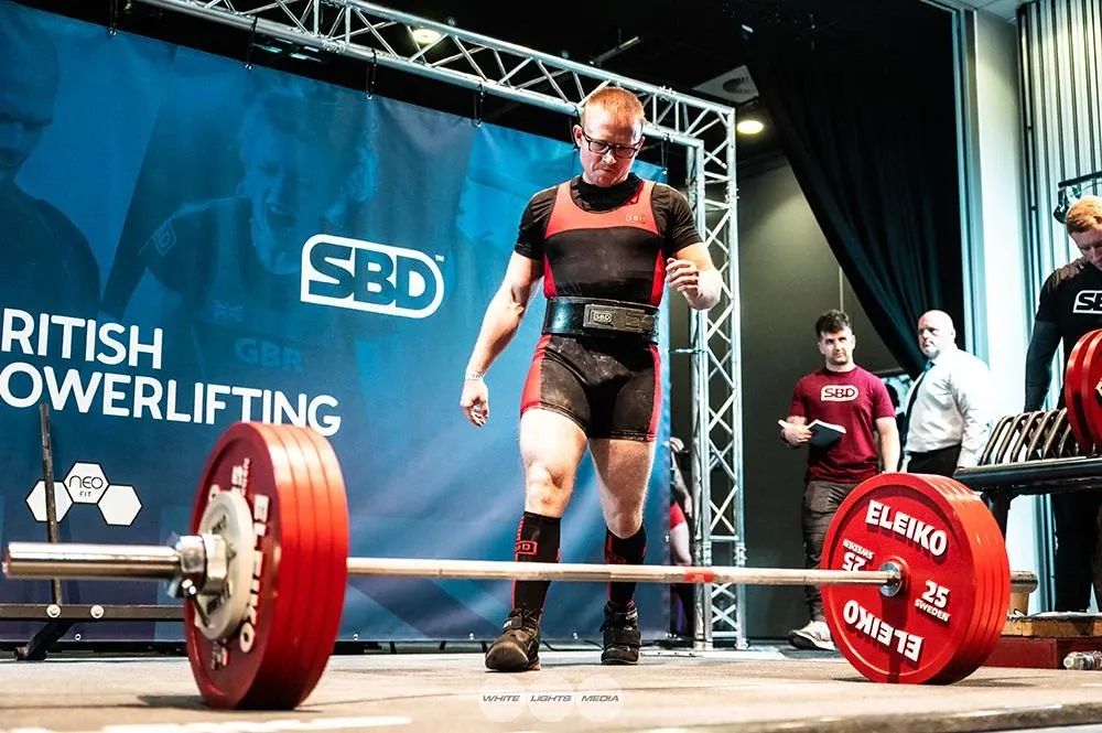 Andrew walking up to the bar for his 235 kg second deadlift