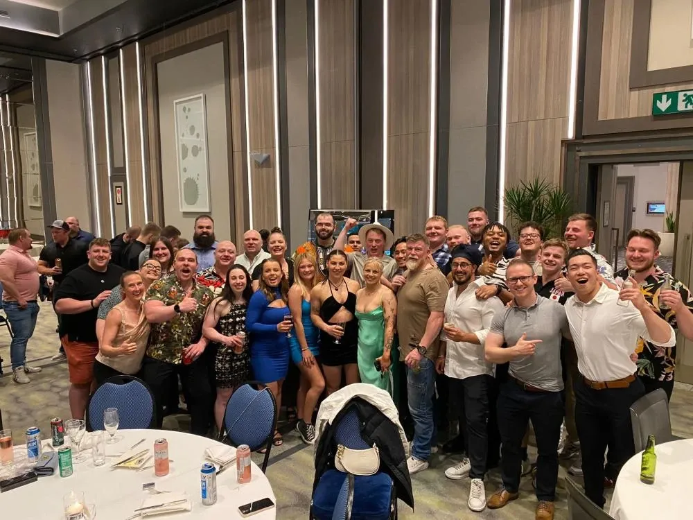 The 2023 GBR bench press team together at an evening event during the IPF World Championships