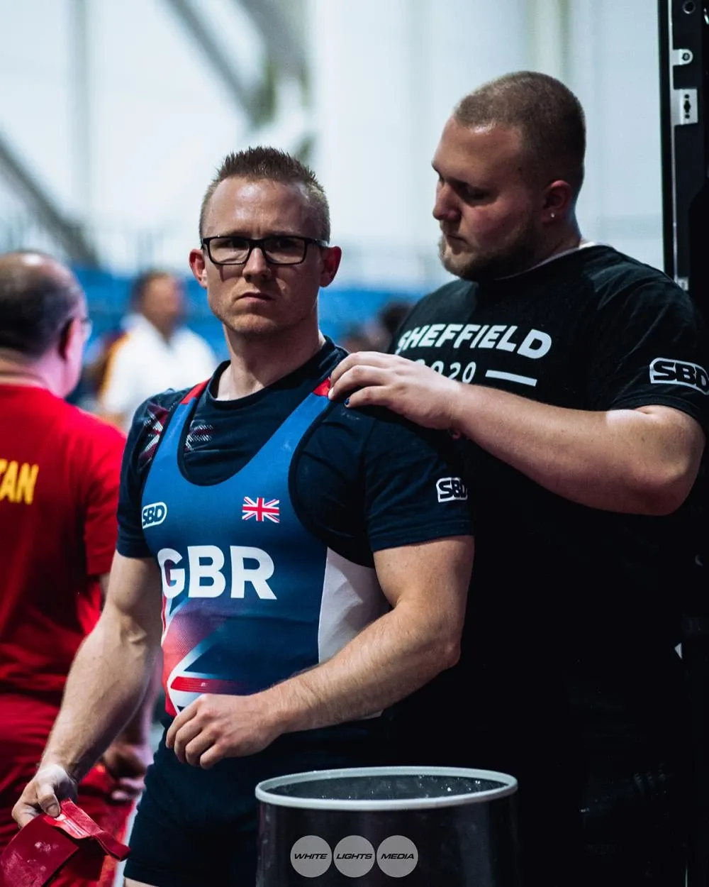 Adam Rutter chalking Andrew’s back before an attempt