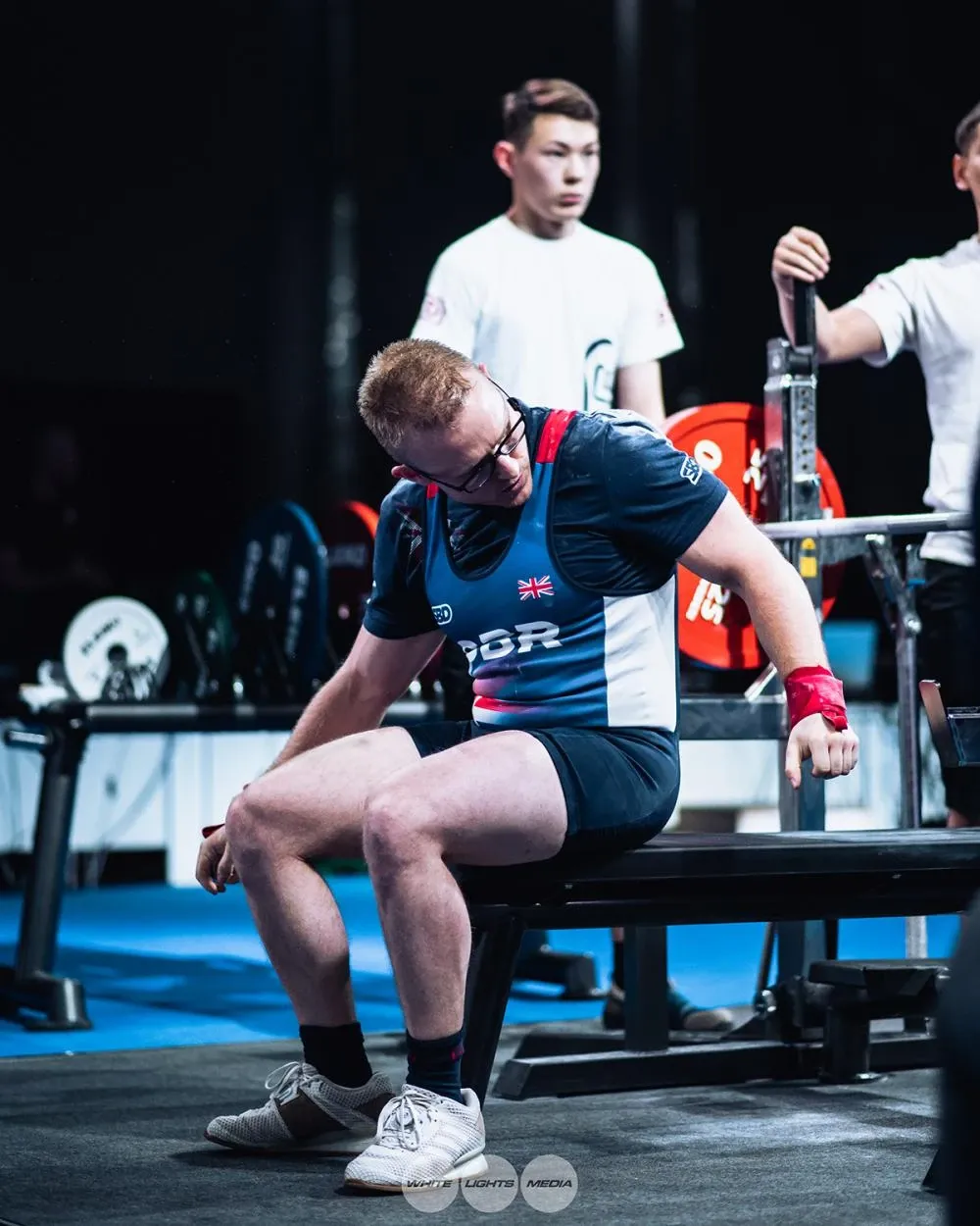 Andrew sitting on the Eleiko bench, getting ready to lie back
